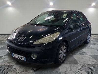 a picture of a black car parked in a garage
