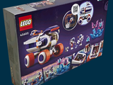 a box of legos with a space ship inside of it