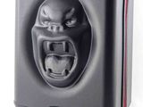 an image of a black suitcase with an angry face on it