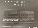 the back cover of a book with the words earth crisis obey written on it