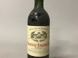 a bottle of wine that is sitting on a table