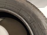 a close up of a tire with a white ball inside of it