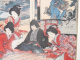 a picture of a group of women sitting on the floor