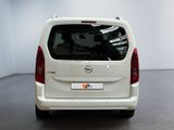 a white van that is parked in a room
