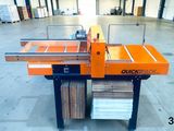 a close up of a machine that is sitting in a warehouse