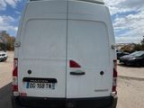 a white van that is parked in a parking lot