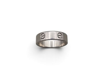 a close up of a ring on a white surface