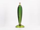 a green glass table lamp on a white background