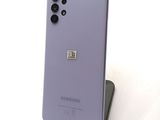 a close up of the back of a purple samsung galaxy s20