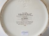 a white plate with a label on it that says villalry and bach