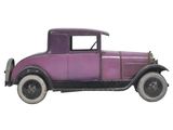 an old purple car is sitting on a white surface with a white background