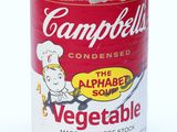 a can of soup with a chef on it on a white surface