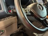 a close up of a steering wheel and dashboard of a vehicle