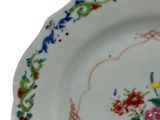 an image of a plate with a flower design on it