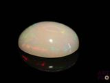 an image of a white oplite in a black background