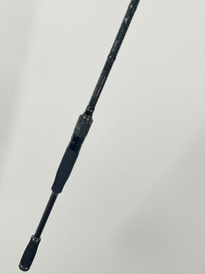 a close up of a fishing rod on a white background