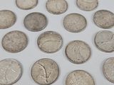 a lot of coins that are sitting on a table