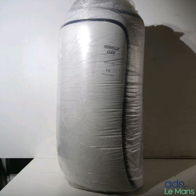 a large bag of plastic wrapped up on a table