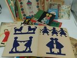 many children ' s books on the table together