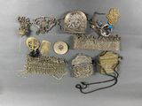 a lot of silver items that are on a table
