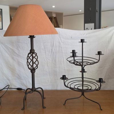 a lamp that is sitting on a table next to a lamp