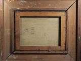 an old picture frame with a picture of a cat in it