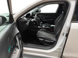 a white truck with its door open and the driver ' s seat down
