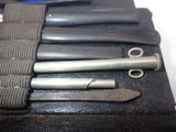 a bunch of tools that are laying out on the table