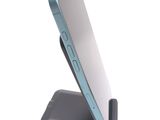 a close up of a cell phone on a stand