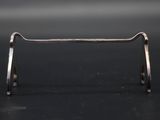 a close up of a pair of scissors on a black surface