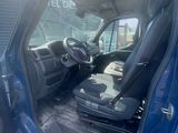 a picture of the inside of a truck with the door open