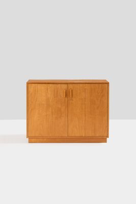 an image of a wooden cabinet with two doors and two drawers