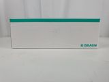 a white box with a green stripe on the side of it