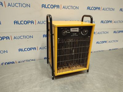 a yellow and black heater sitting on top of a gray floor