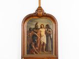 an image of a painting of jesus on a cross hangs on a wall