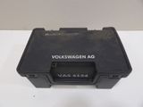 a close up of a black box on a white surface