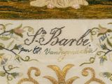 a picture of an embroidered banner with a picture of a woman