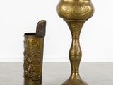 two vases that are sitting next to each other on the floor