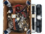 a box full of assorted watches and other items