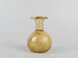 a small glass vase that is sitting on a table
