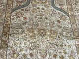 a large oriental rug on the floor in a room