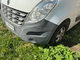 a white van that is parked on the side of the road