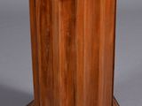 an image of a wooden pedestal with a marble top