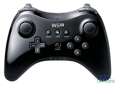 the wii controller is black and has four buttons on each side of it