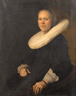 portrait of a woman in a black dress with a white ruffle on her head