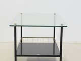 an image of a glass coffee table with a shelf underneath it