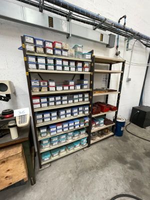 a room with a lot of items on the shelves