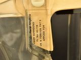 a close up of a hockey helmet with a sticker on it