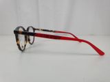 the glasses are made of tortoises and have red rims