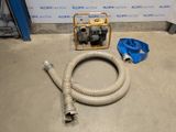 a hose and a hose on the floor next to a wall